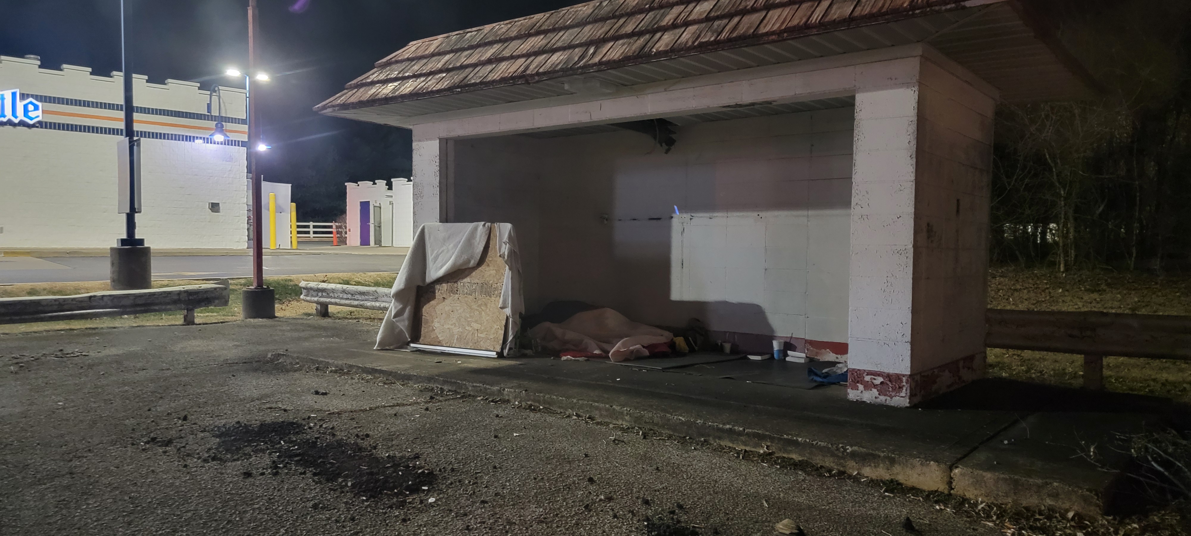 A community member in a public space during outreach hours
